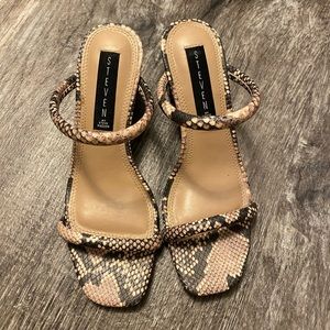 Steven Madden snake skin heels.